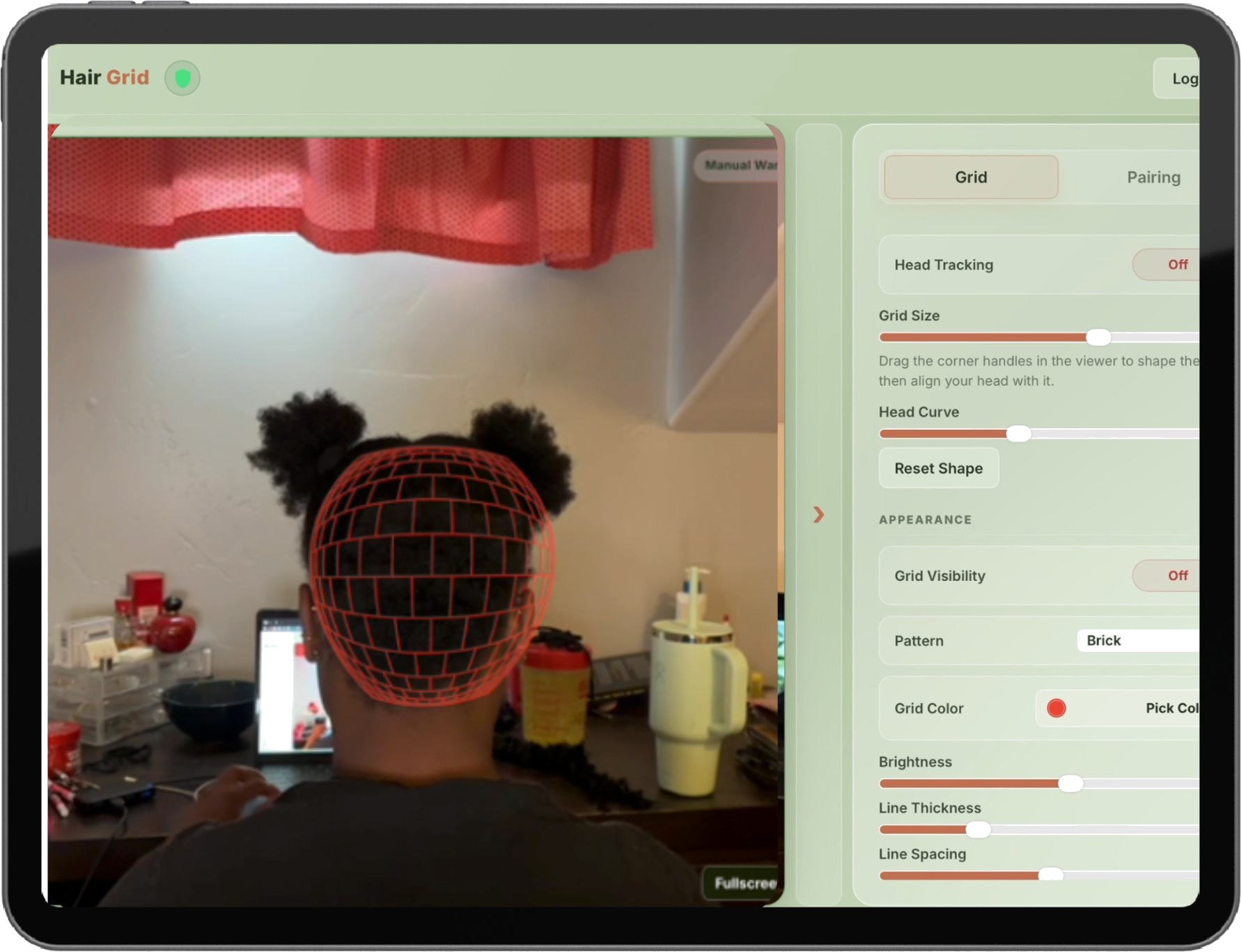 HairGrid℠ app showing grid overlay on the back of a head with customizable controls for line parting, thickness, color, and density